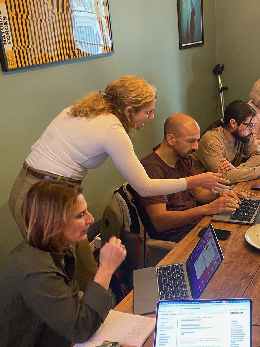 Verena helping participants at a workshop