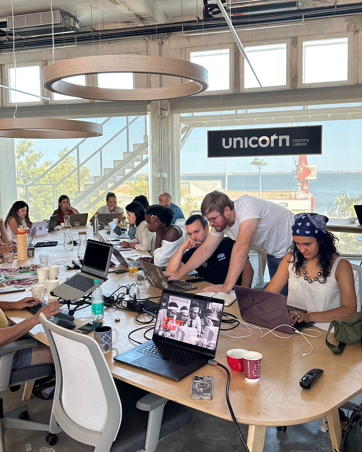 Participants working on laptops at a CoLab workshop